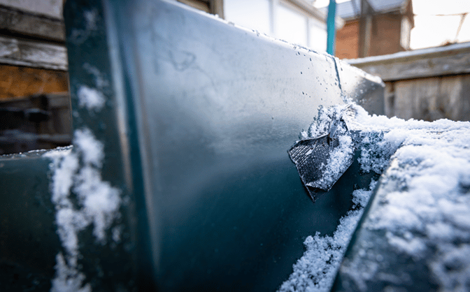 heating oil tank with snow on